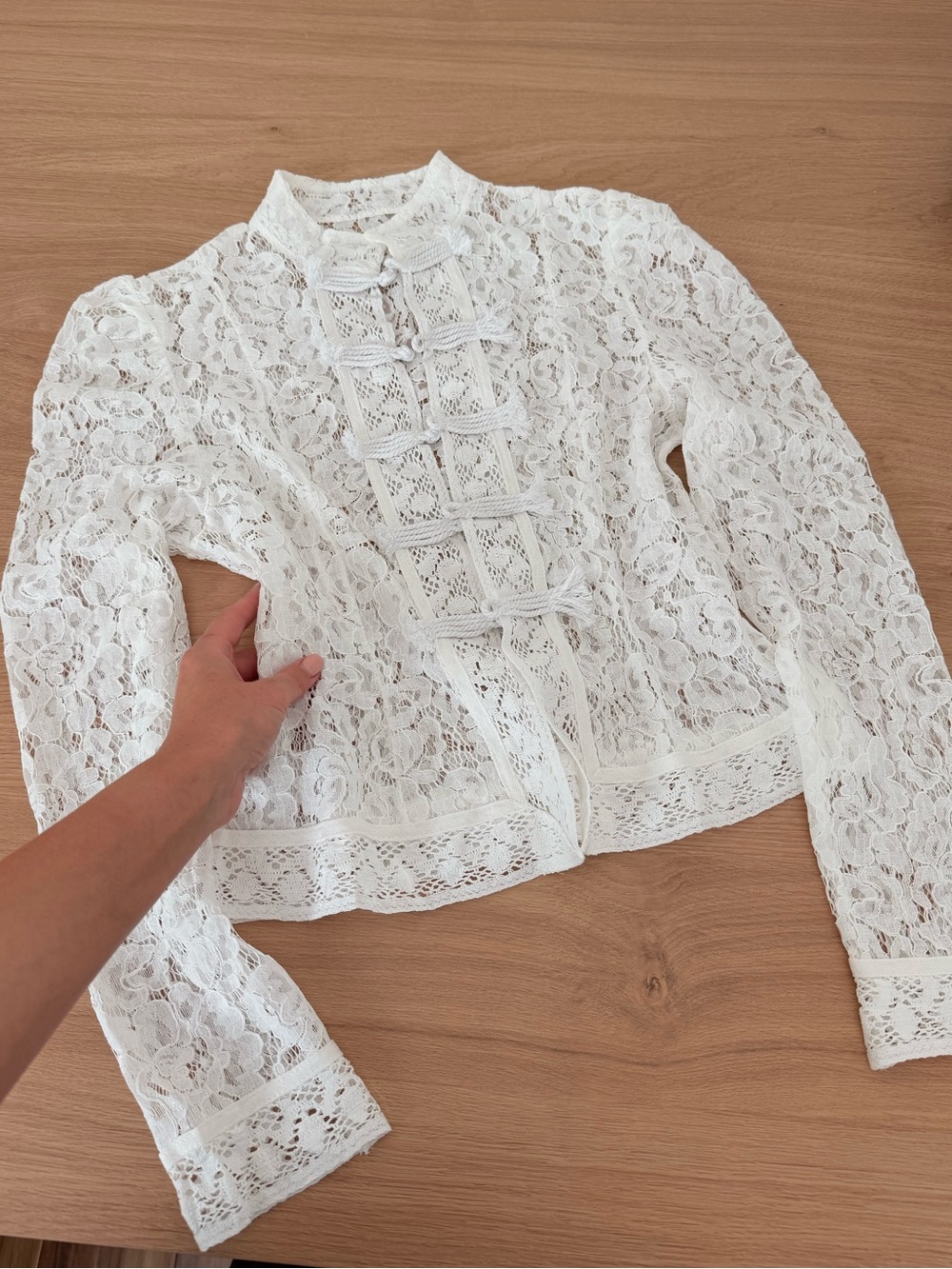 Elegant white lace blouse with beautiful vintage-inspired details